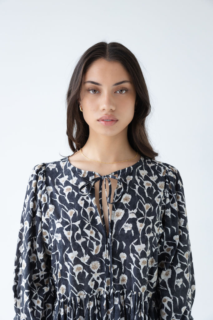 Woman wearing a Sophie Cotton Midi Dress in Coast floral print