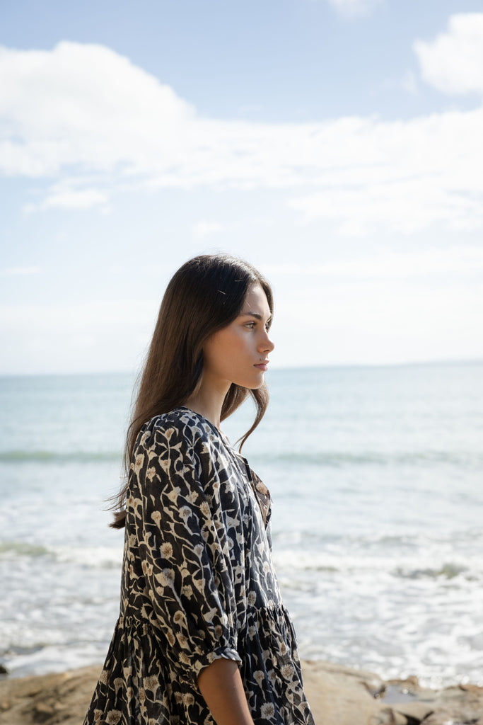 Woman wearing a Sophie Cotton Midi Dress in Coast floral print