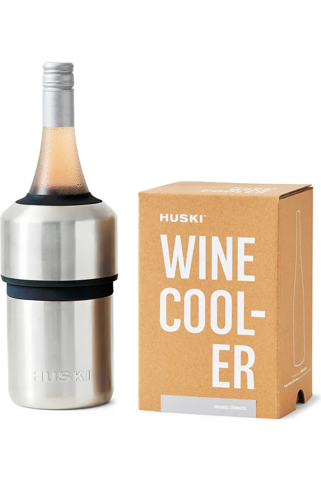 Huski Wine Cooler Brushed Stainless.  Image shows Wine Cooler with cold bottle of Rose in it, sitting beside the die cut Kraft gift box that the Wine Cooler is sold in.