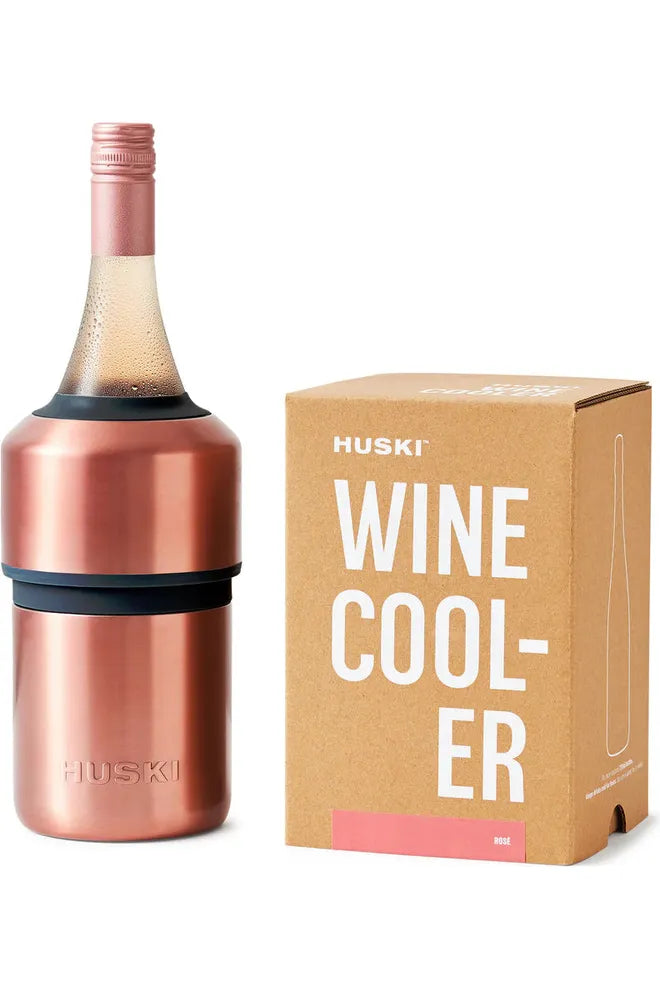 Rose Huski Wine Cooler.  Image shows Wine Cooler with cold bottle of Rose in it, sitting beside the die cut Kraft gift box that the Wine Cooler is sold in.