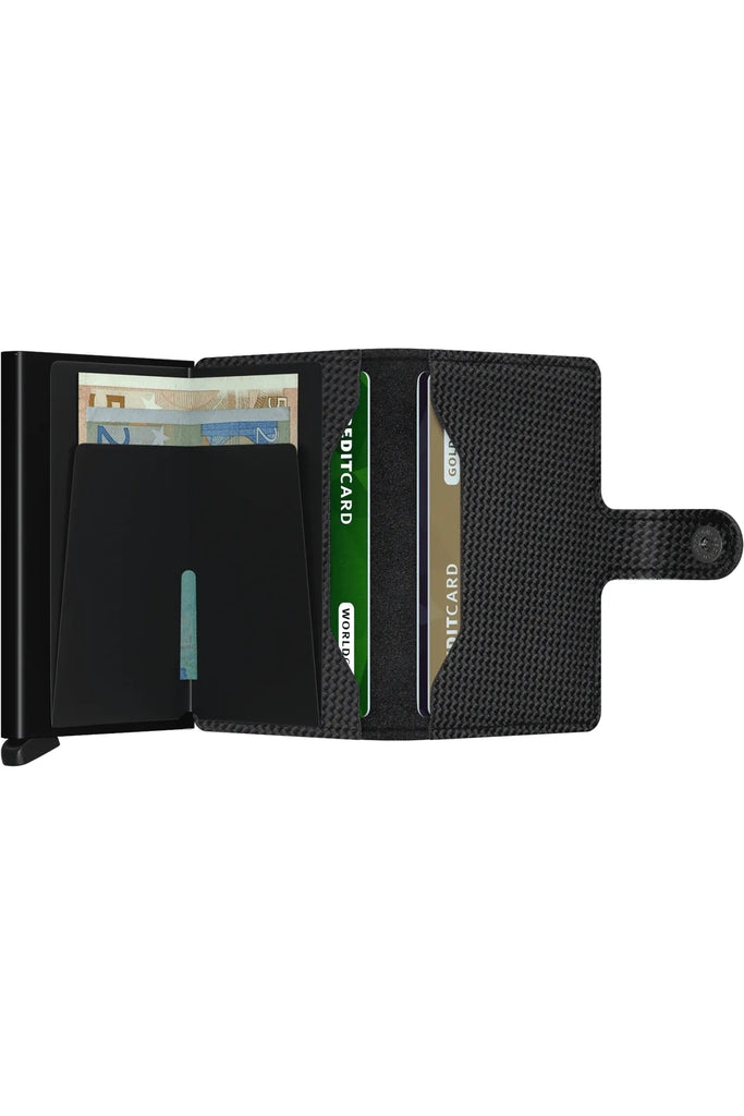 Secrid Miniwallet Carbon Black opened out showing billfold and side pockets for additional cards