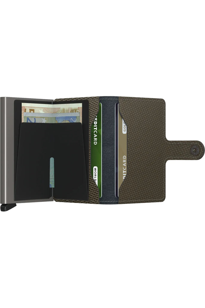 Secrid Miniwallet Carbon in Khaki  opened out showing manifold for notes and pockets for additional cards