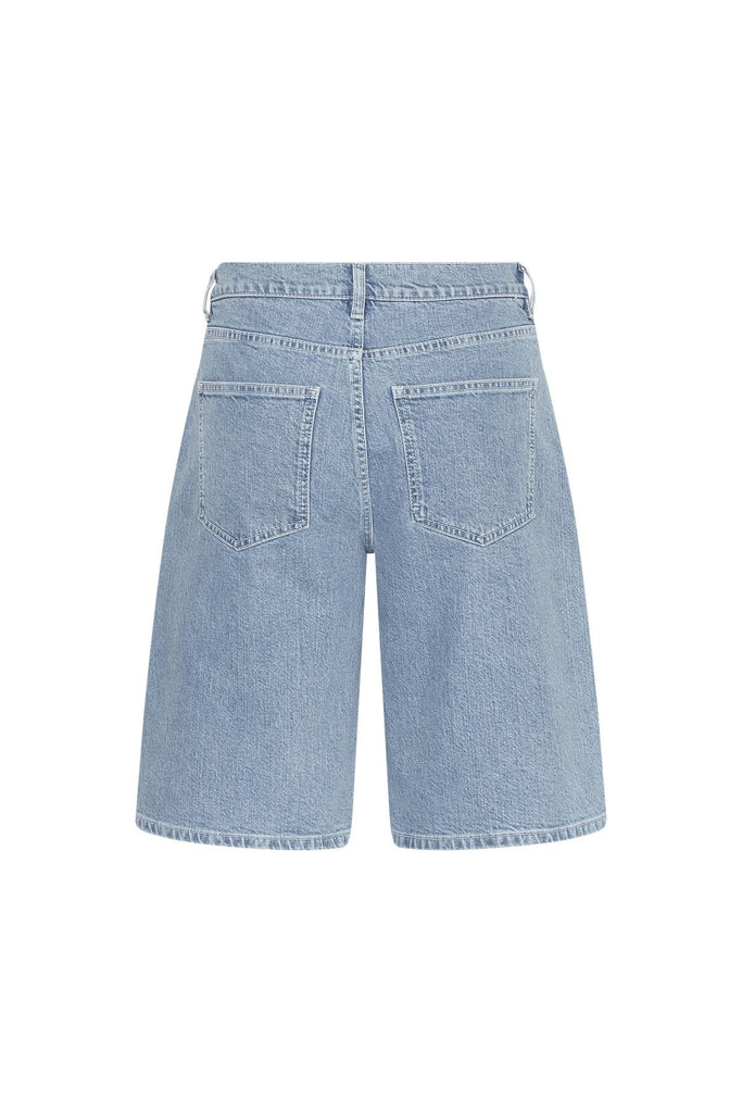 Back view of Denim shorts on a grey background. MSCH Elida Ada Denim Bermuda Shorts.