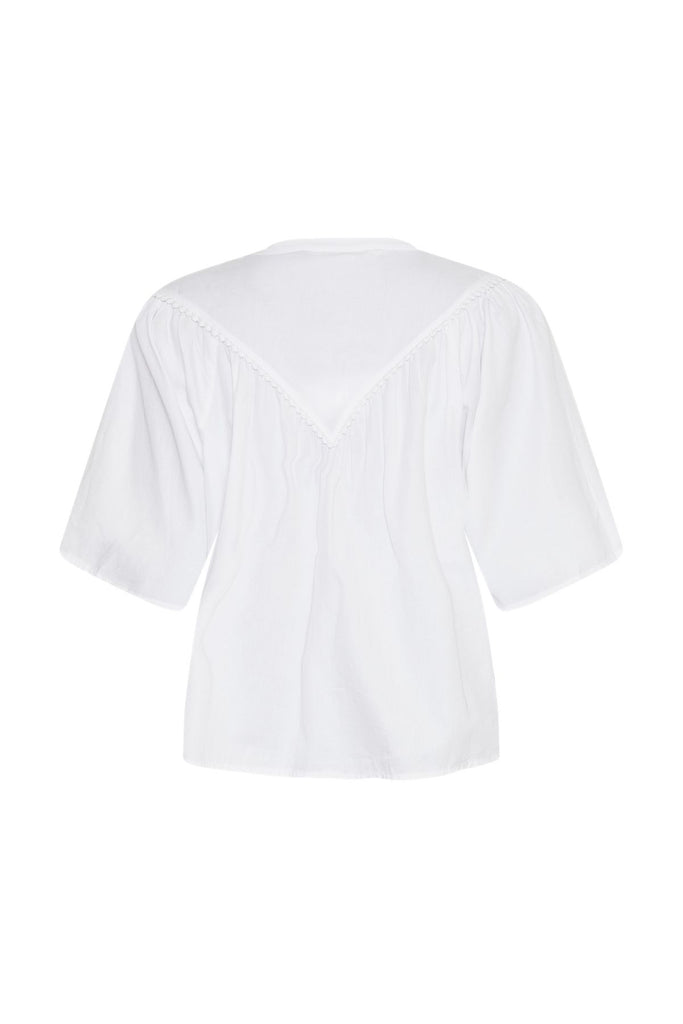 white blouse on a white background