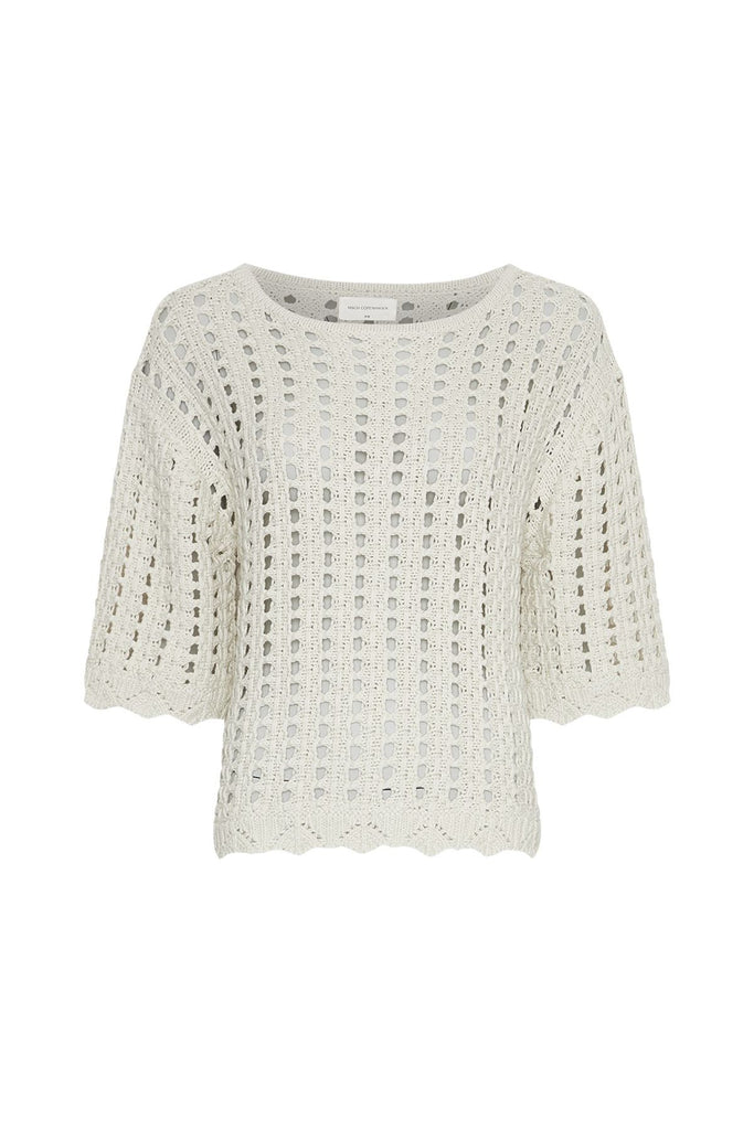 Off white crochet top against a gray background. MSCH Copenhagen Fairyn Top.