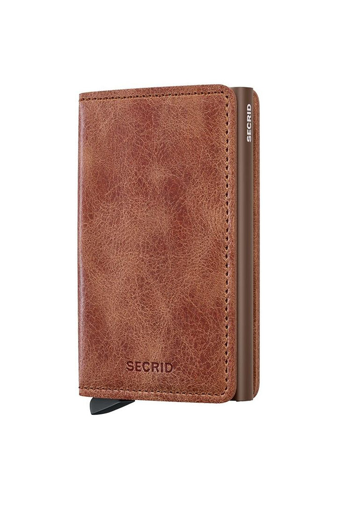 Secrid Slimwallet Vintage. Brown leather wallet with Secrid branding on a white background.