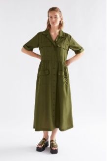 Woman wearing an Elk Eine shirt dress in Olive with a white background
