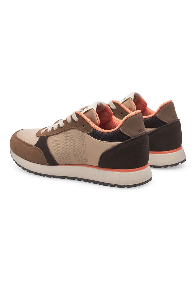 Pair of brown and beige sneakers with white laces on a light gray background. Woden Ronja Sneakers in Coffee Cream
