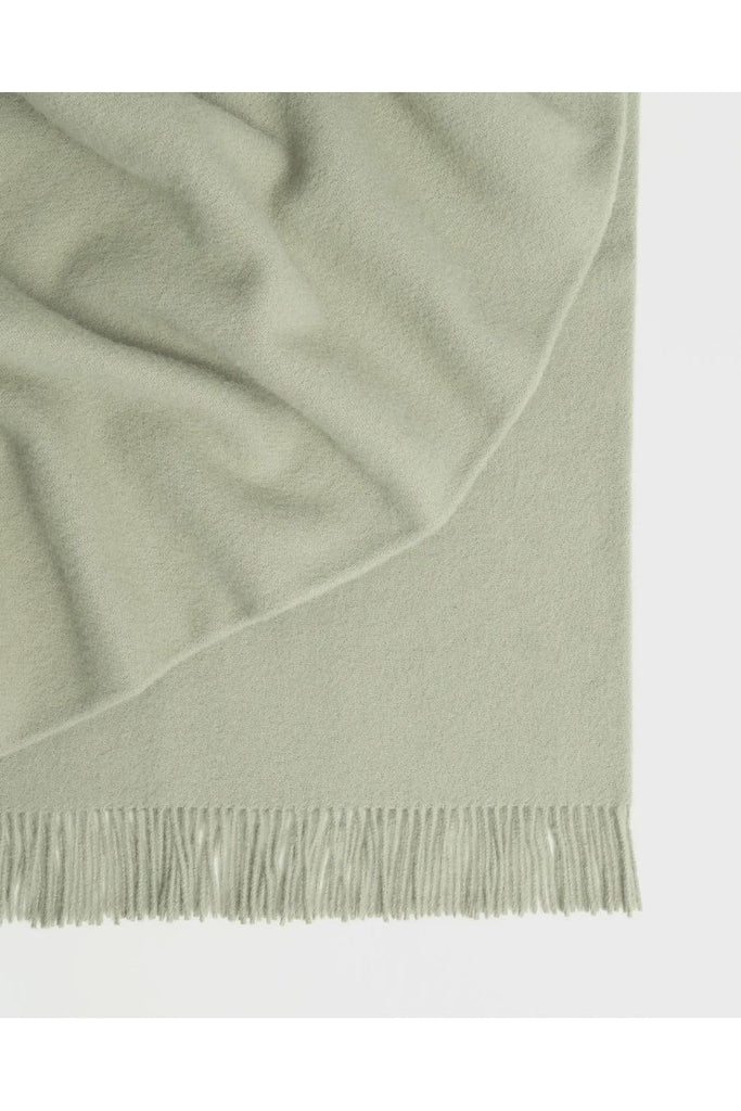 Warwick NZ Weave NZ 100% NZ Wool Nevis Throw Blanket in Thyme a calming, herbaceous, subtle green.