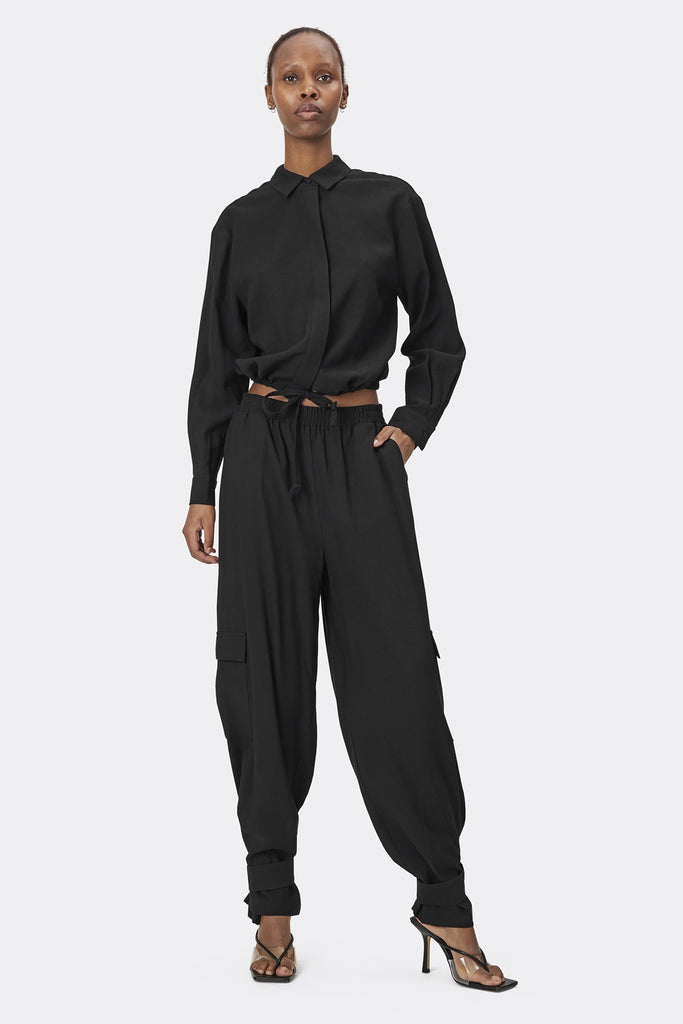Lolllys Laundry Black Baja Pants with the black Tobago Shirt on model front view