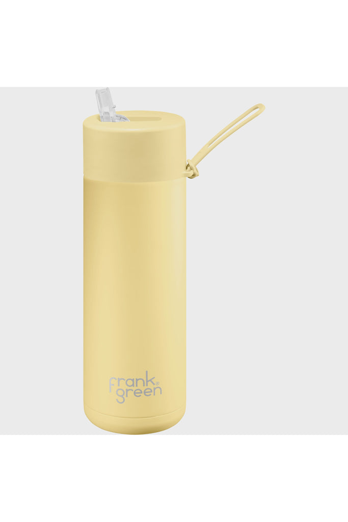 Frank Green Ceramic Reusable 20oz Bottle in Buttermilk Pale Yellow Side View showing upright mouth sipper and bottle handle