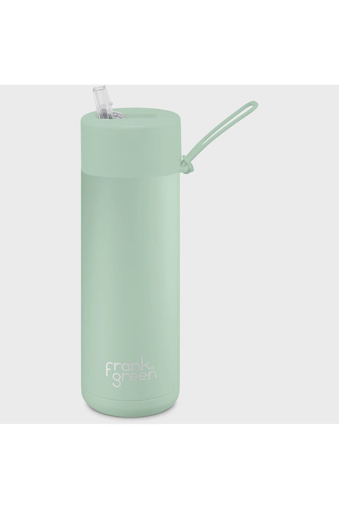 Frank Green 20oz Reusable Ceramic Bottle in Mint Gelato a soft pastel green.  Side View showing sipper lid standing upright and bottle handle