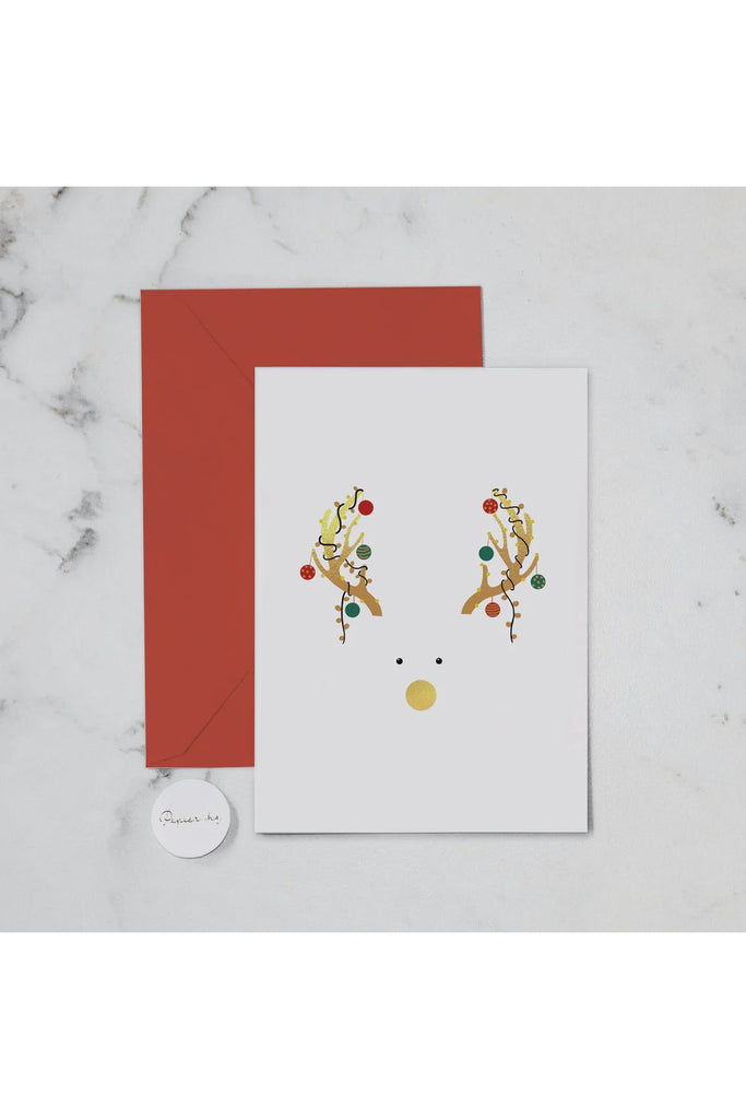 Papier HQ Christmas Greeting Card featuring the face of a reindeer with decorated antlers 