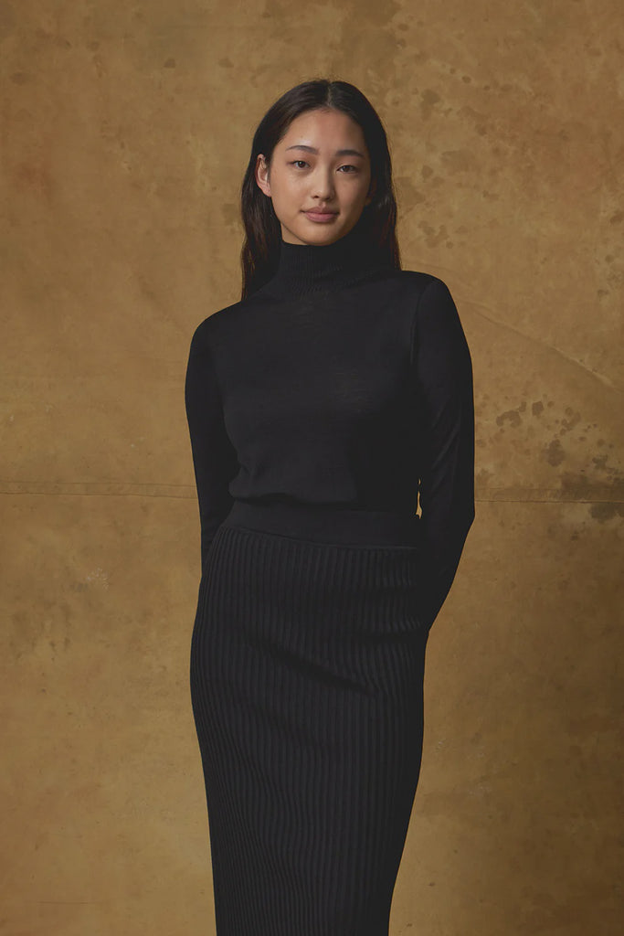 Standard Issue Merino Skivvy Black on model front view