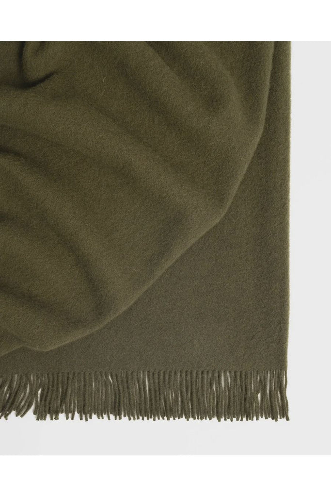 Warwick NZ Weave 100% Wool Nevis Throw in Kelp a rich, utilitarian green.