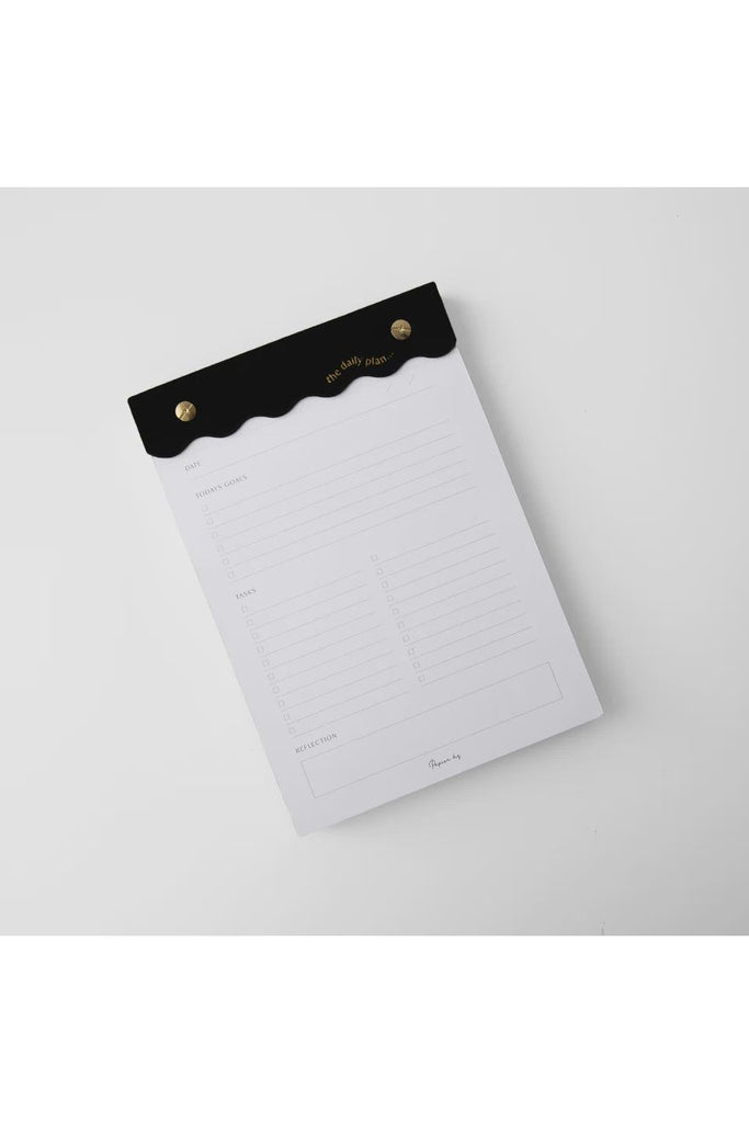 Papier HQ's Curved Daily Notepad  Black header showing top page 